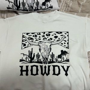I’m selling these white western crewnecks super cute brand new never worn